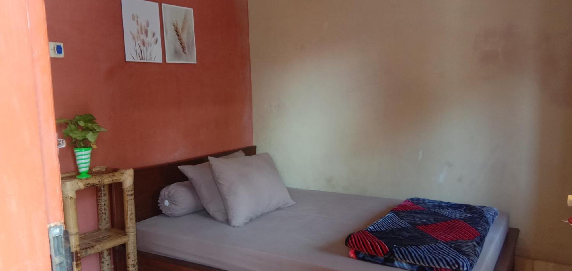 Radiya Guesthouse سيمبالون لوانج الغرفة الصورة